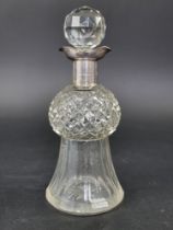 A late Victorian silver mounted cut glass thistle decanter and stopper, by Saunders & Hollings,