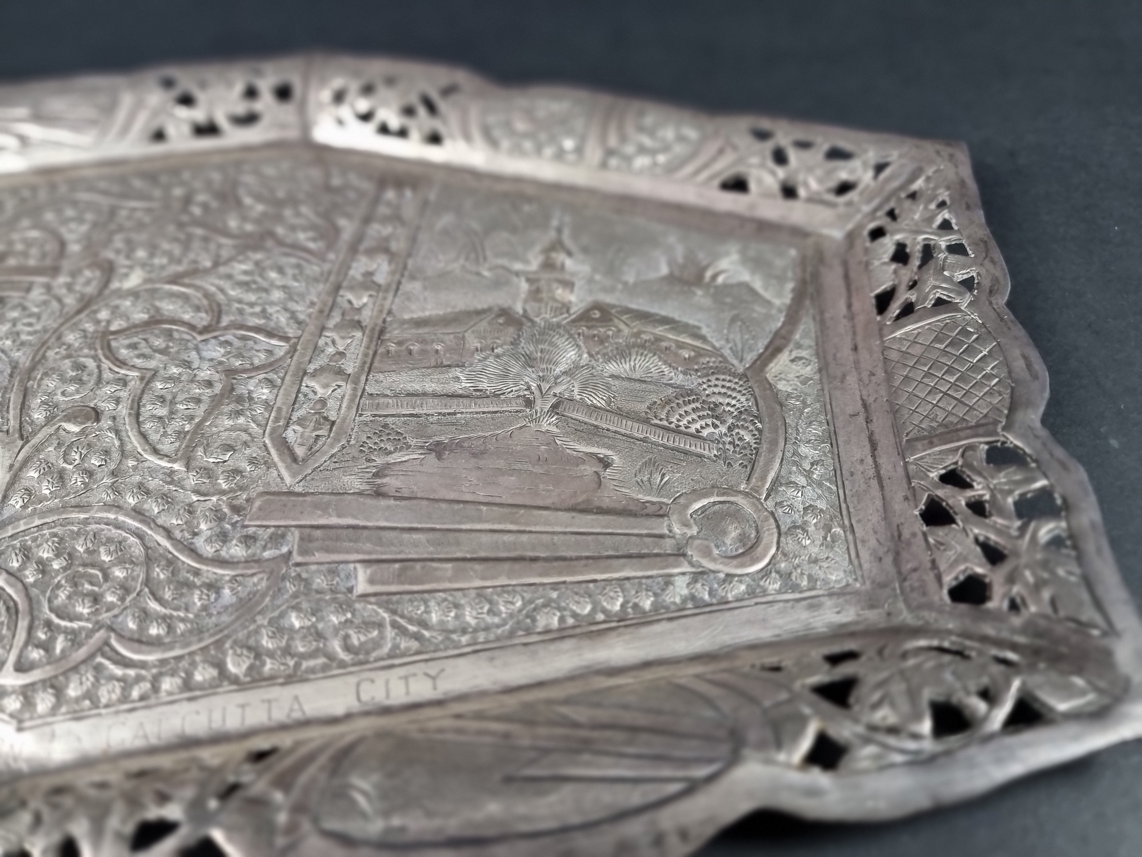 An Indian white metal tray, stamped 'T94', 35cm wide. - Image 2 of 4