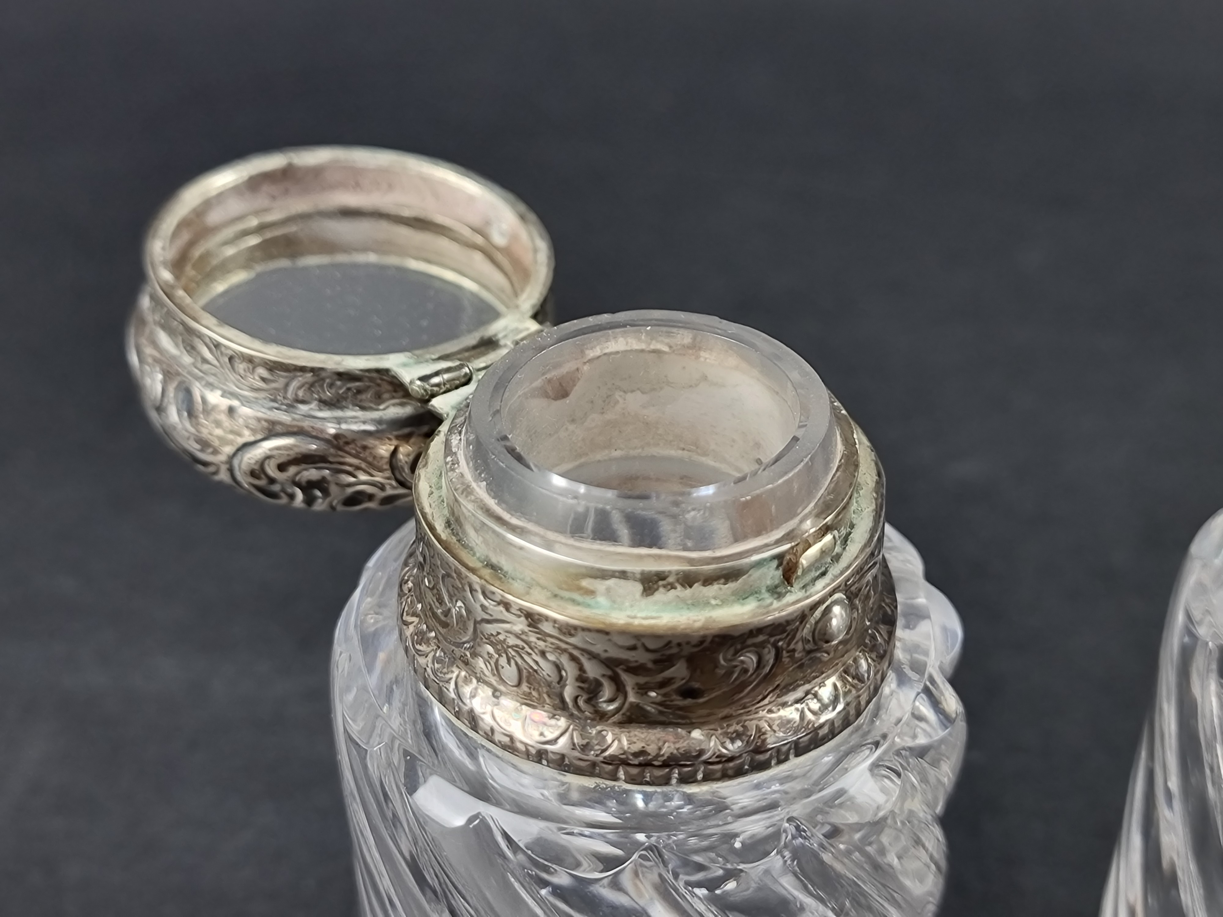 Two Victorian silver mounted scent flasks, maker's mark rubbed, London 1880, 12.5cm high. (2) - Image 3 of 3