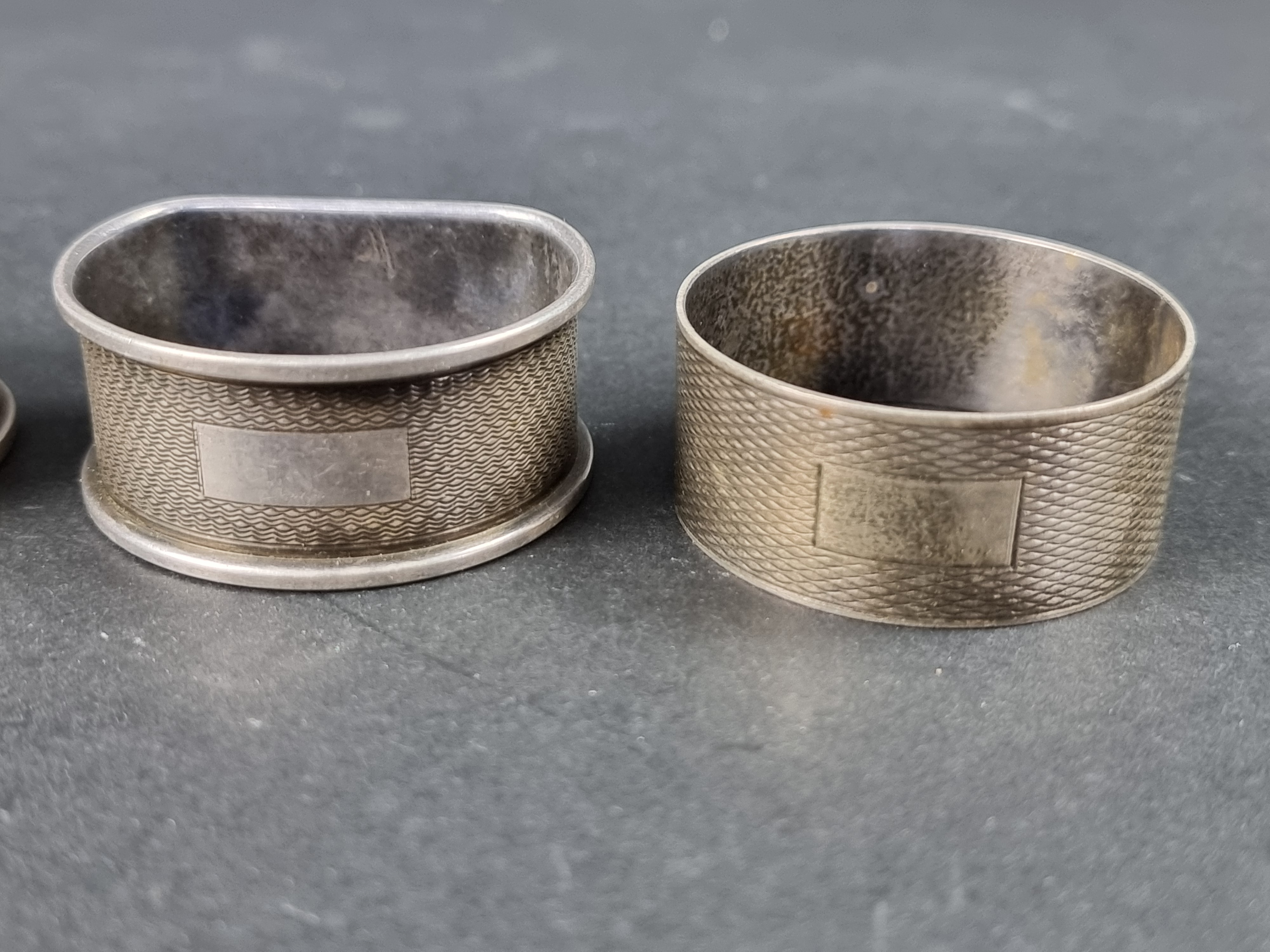 A pair of silver napkin rings, by Henry Griffith & Sons Ltd, Birmingham 1948/9; together with two - Image 2 of 3