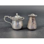 A silver mustard pot, by James Ramsay, Sheffield 1911, 6.5cm high; together with a silver pepper,