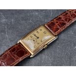 A Swiss Art Deco two tone 9ct gold manual wind wristwatch, 24 X 31mm, the movement stamped 63, on