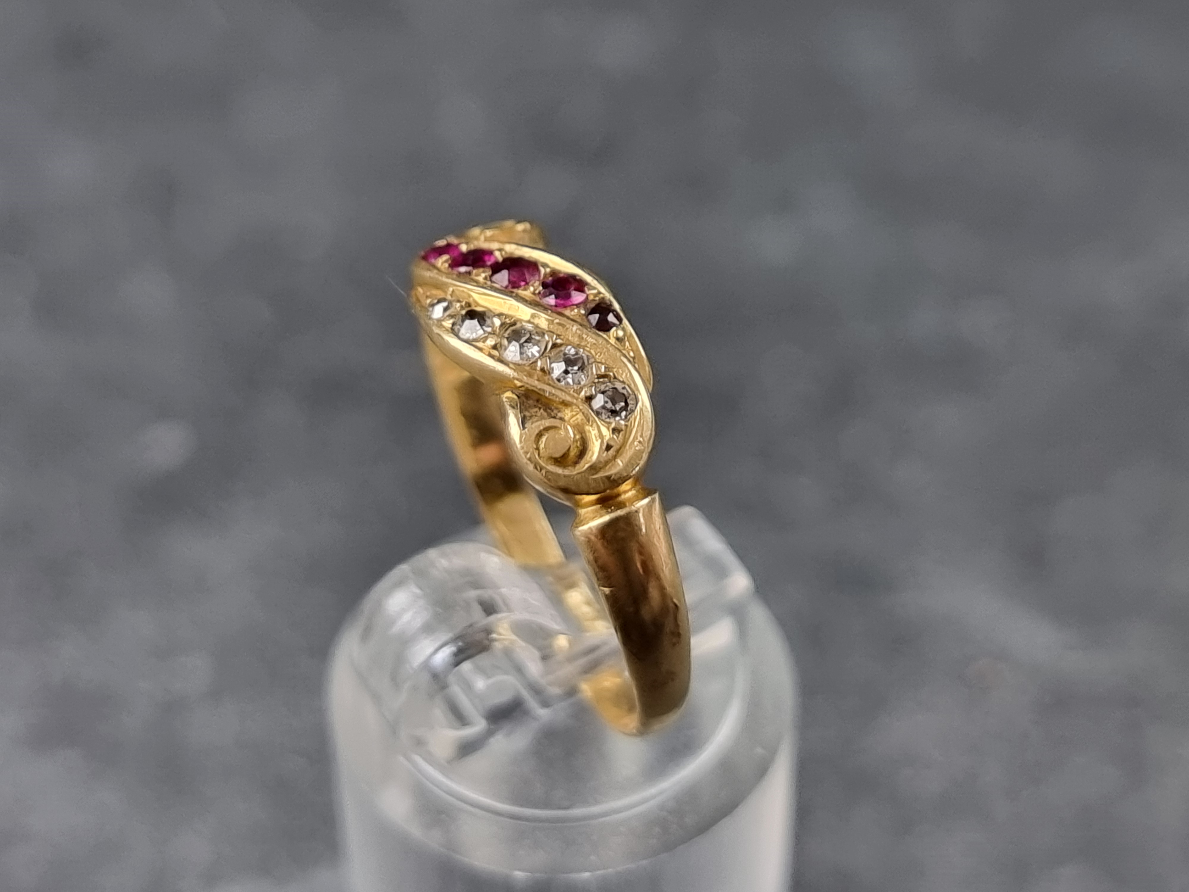 An 18ct gold ruby and diamond ring, set five diamonds and five rubies, size R, 2.6g. - Image 2 of 3