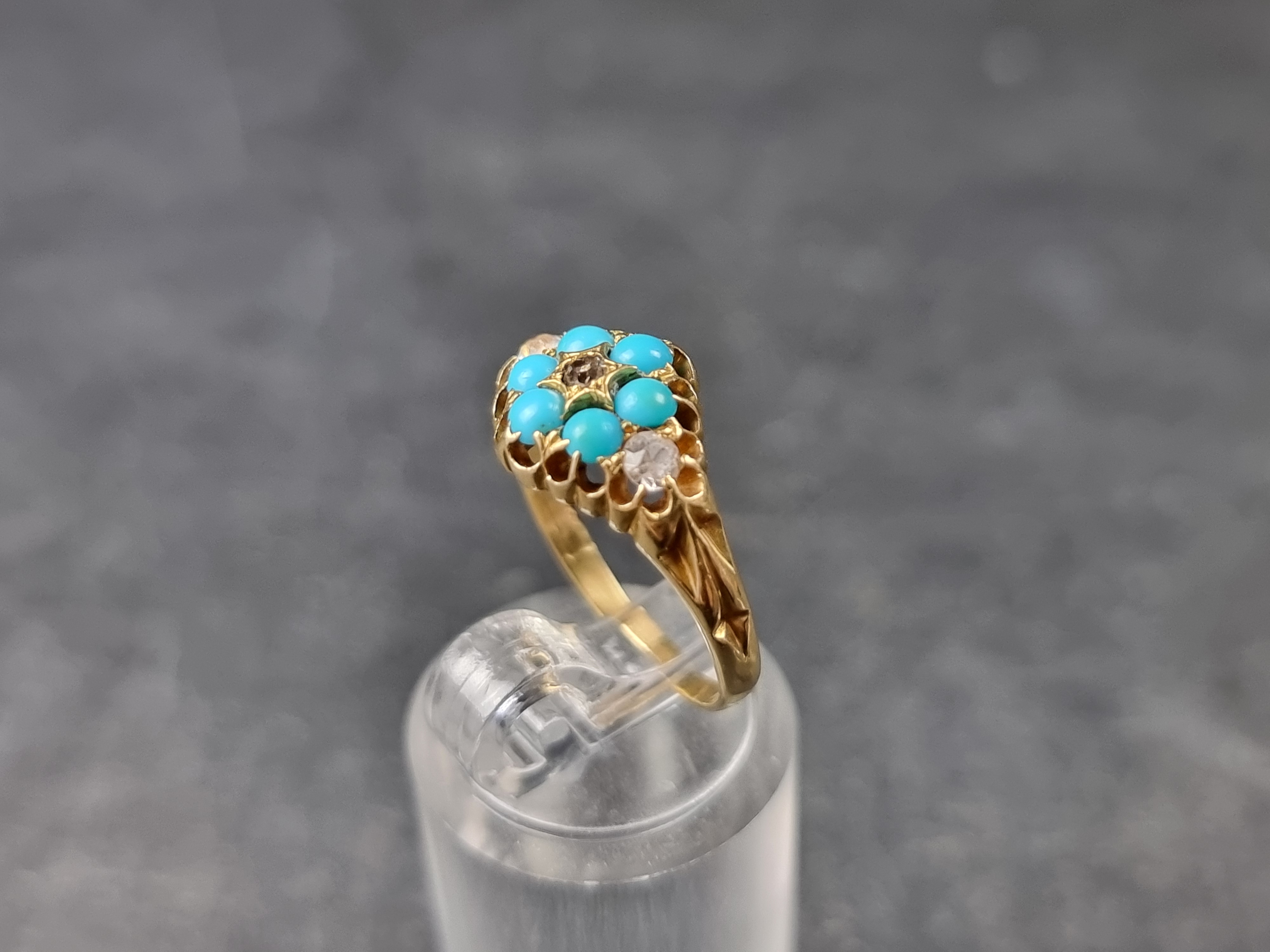 A Victorian yellow metal ring, set one diamond, two colourless gemstones and six cabochon turquoise, - Image 2 of 3