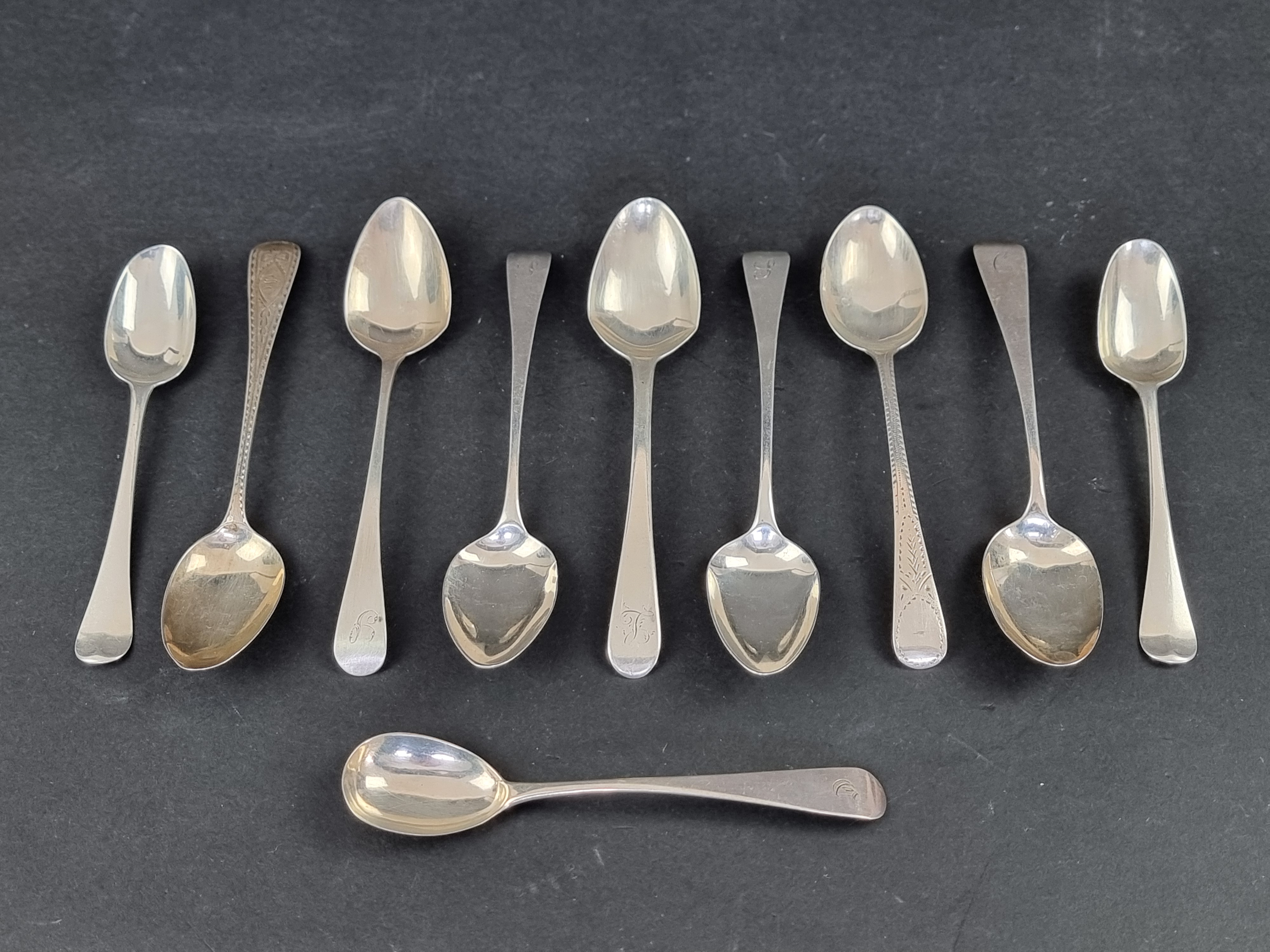 Ten various silver teaspoons, 142g.