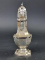 A silver sugar caster, by Walker & Hall, Sheffield, 1916, 23cm high, 228g.