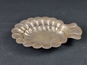 A white metal dish, stamped 'Sterling', 20.5cm wide.