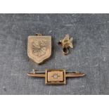 A bar brooch, set central mine cut diamond, stamped '9ct'; together with two other items. (3)  All