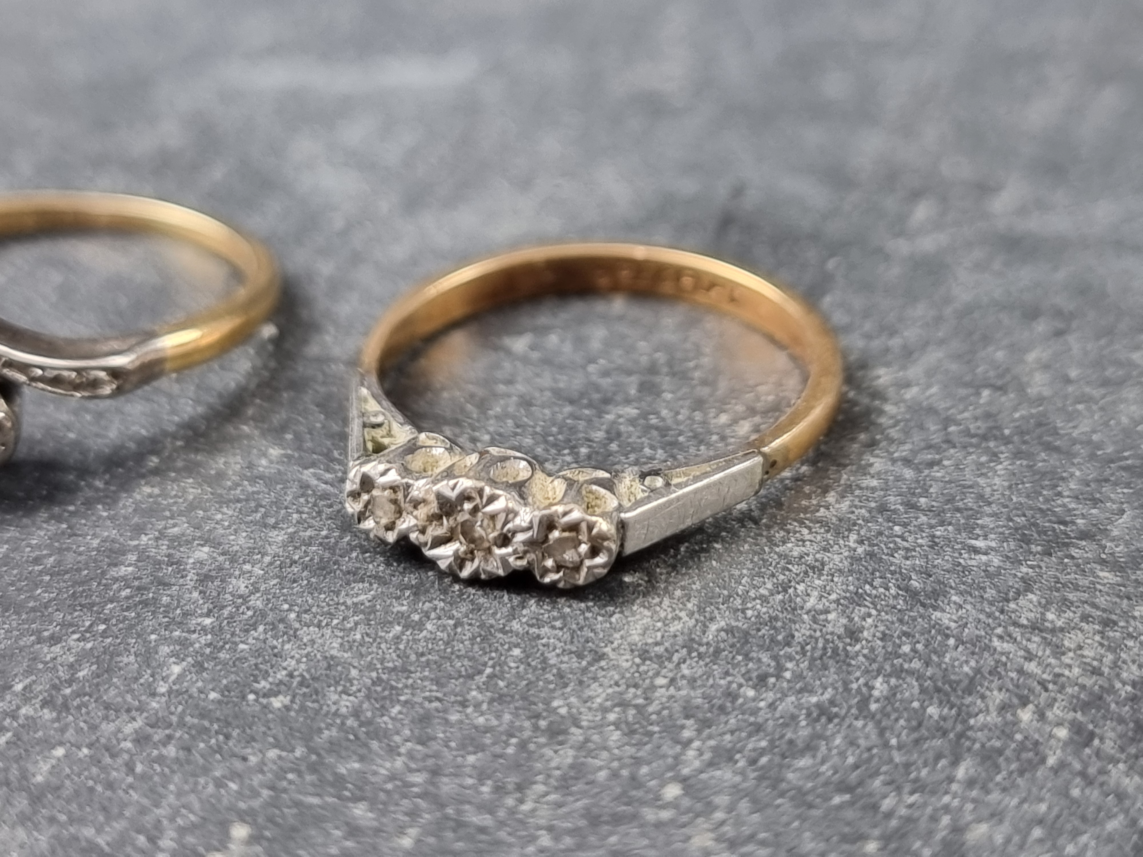A yellow metal diamond three stone ring, stamped '9ct & plat', size K 1/2; together with a yellow - Image 2 of 3