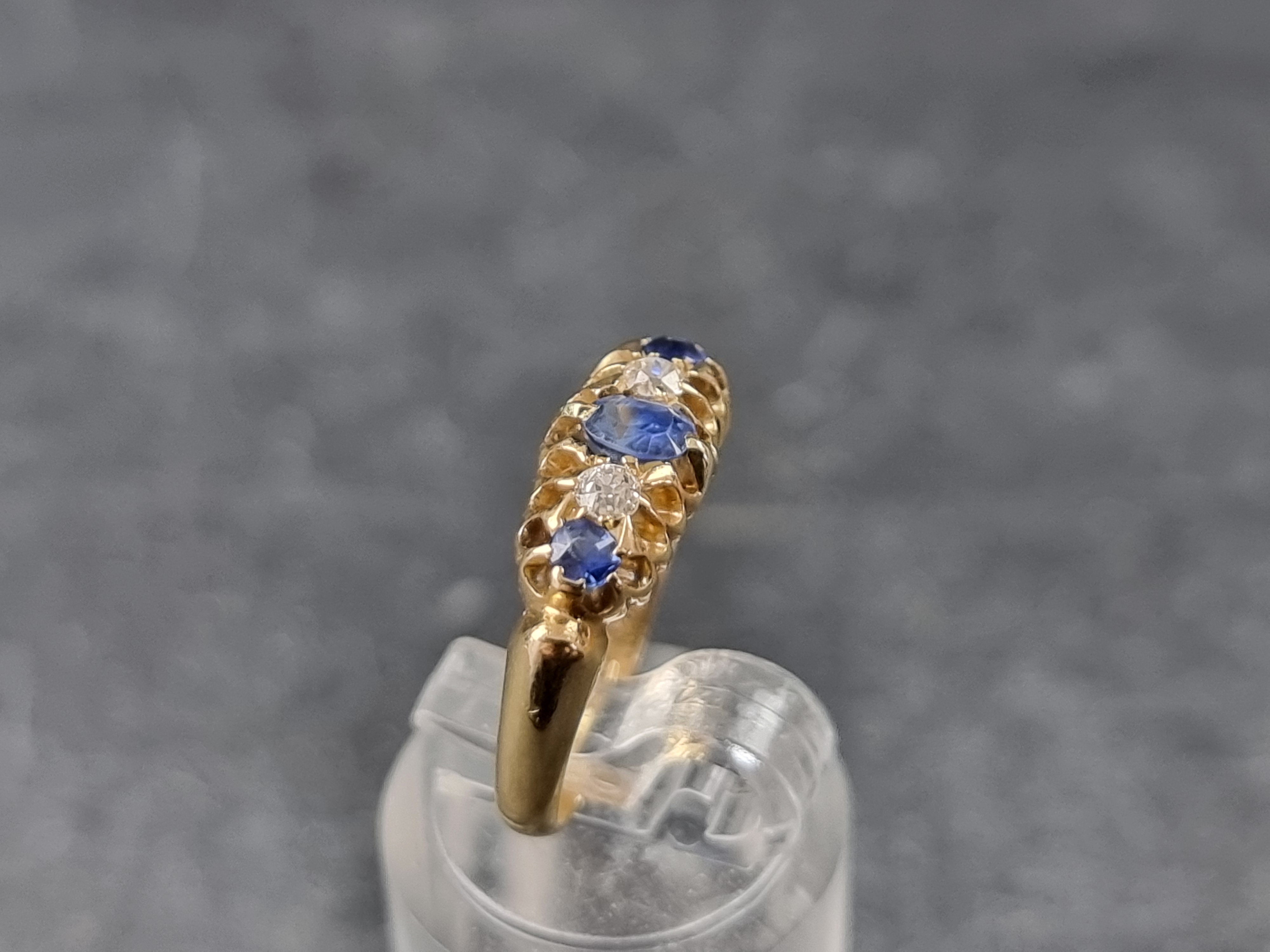 An Edwardian 18ct gold diamond and sapphire five stone ring, Birmingham 1905, size K 1/2, gross - Image 2 of 3