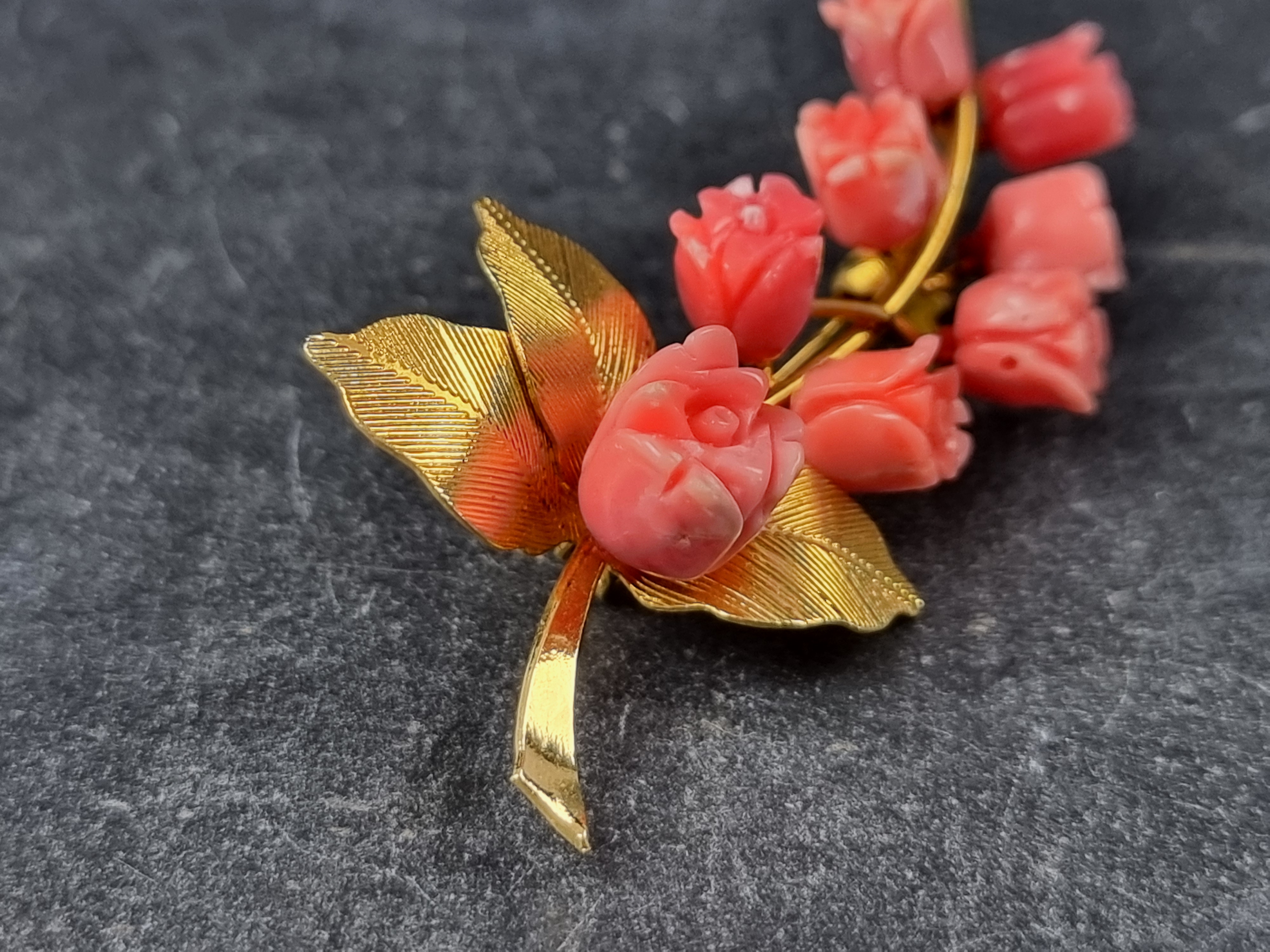 An Eastern gold plated and carved coral floral brooch, 64mm high. - Image 2 of 4