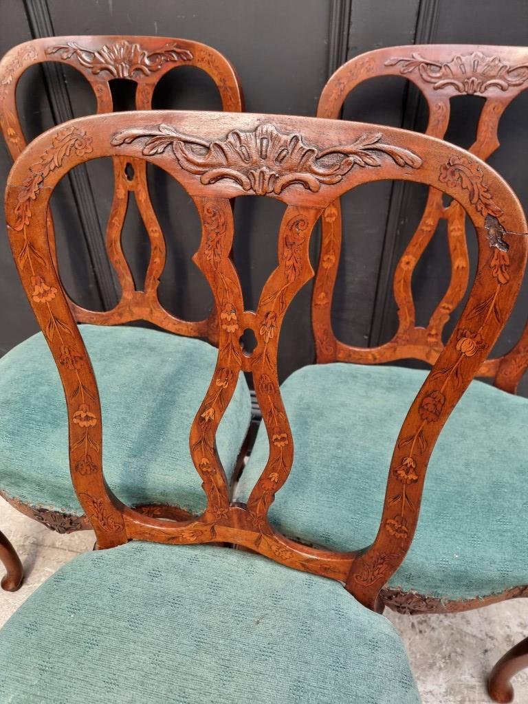 A set of three 18th century Dutch carved walnut and marquetry dining chairs. (3) - Image 2 of 4