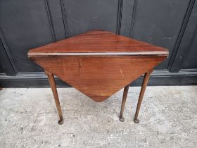 An antique mahogany triangular gateleg table, 83.5cm wide.
