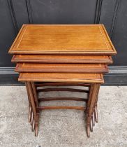 A set of Edwardian mahogany and satinwood banded quartetto tables, largest 56cm wide.