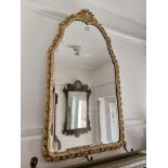 A gilt framed wall mirror, 75.5 x 43cm.