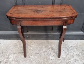A Regency mahogany and ebony strung card table, with double gateleg action, 86.5cm wide.