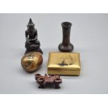 A small group of Oriental items, to include a bronze Buddha, 14cm high. (5)