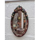 A vintage Barbola framed oval wall mirror, 41 x 24.5cm.