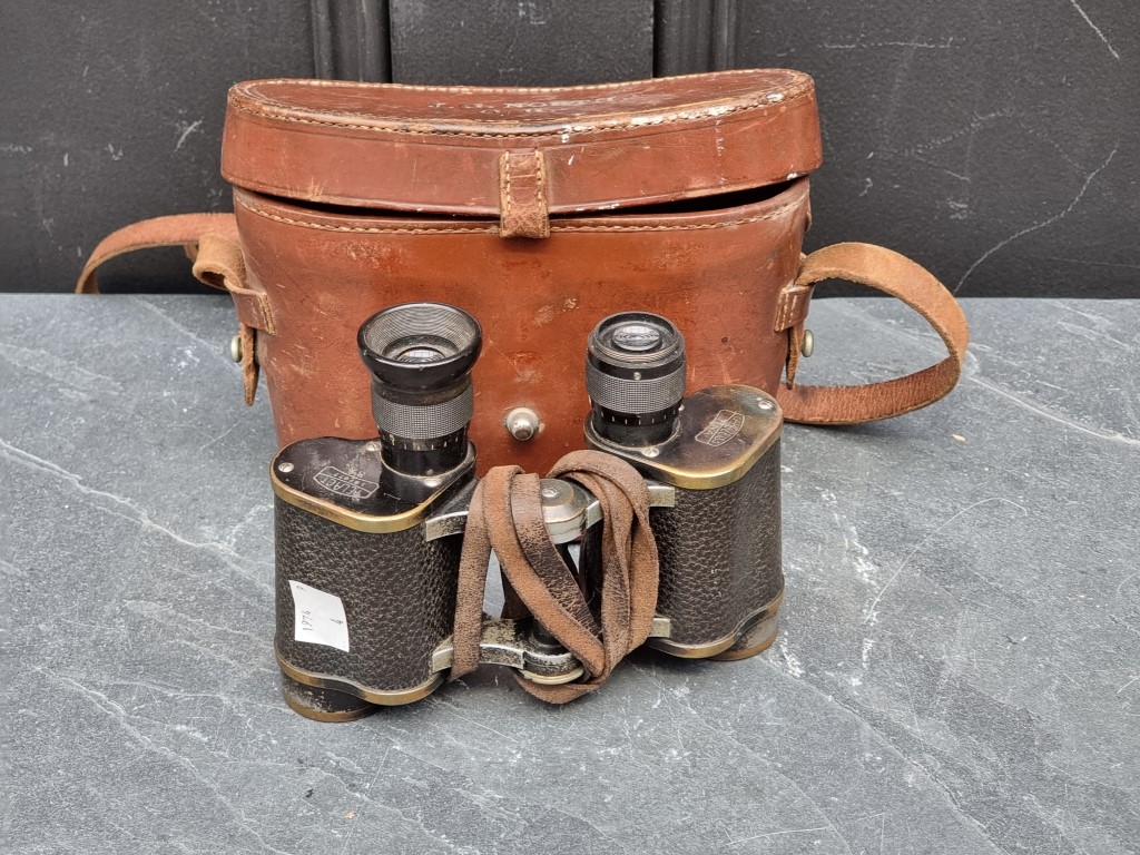 A pair of Carl Zeiss Telact 8X binoculars, cased.