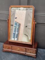 An 18th century mahogany and parcel gilt toilet mirror, 47cm wide.