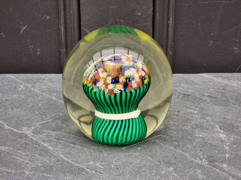 A large antique glass paperweight, 11.5cm high.