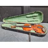 An antique Continental violin, bearing internal label indistinctly inscribed '...1830, Ladislaus