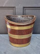 A George III mahogany and brass bound peat bucket, 34cm wide.