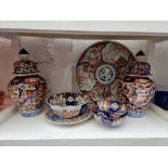 A collection Japanese Imari porcelain, to include a charger, 35cm diameter. (7)