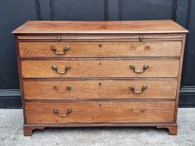 A George III mahogany chest of drawers, with brushing slide, 125cm wide.