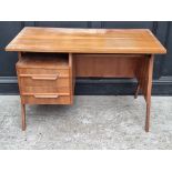 A mid-century continental walnut desk, 110cm wide.