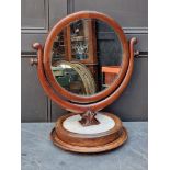 An unusual 19th century mahogany and marble toilet mirror, 61cm high.