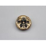 A Victorian brass novelty 'Man In The Moon' vesta case, 4.5cm wide.