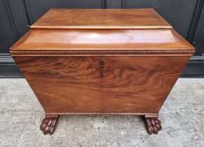 A George IV mahogany sarcophagus cellarette, on paw feet, with partially fitted interior, 69cm wide,