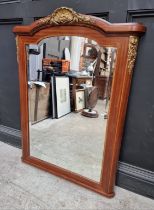 An early 20th century mahogany, satinwood crossbanded and gilt brass mounted overmantel mirror,