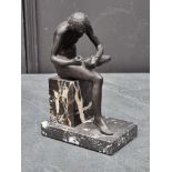 A Grand Tour style bronzed figure of Spinarola, 18cm high.