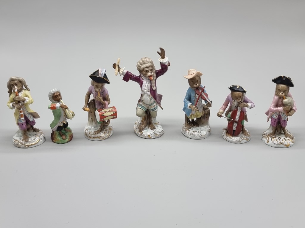 A set of nine Dresden porcelain 'Monkey Band' figures, largest 17cm high; together with another - Image 3 of 6