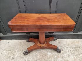 A Victorian mahogany pedestal card table, 91cm wide.