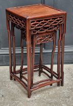 A nest of three Chinese hardwood occasional tables, largest 38cm wide, (lacking second smallest from