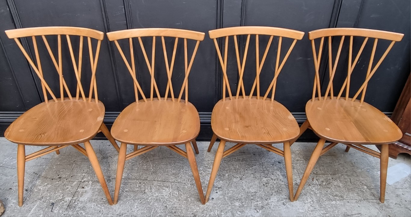 A set of four mid-century Ercol 'Candlestick' dining chairs.
