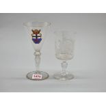 An interesting glass armorial goblet, finely enamelled, 17.8cm high; together with a 'Souvenir De