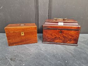 A George III mahogany sarcophagus tea caddy, with concealed drawer, 24.5cm wide; together with