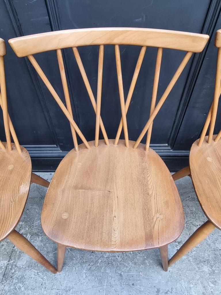 A set of four mid-century Ercol 'Candlestick' dining chairs. - Image 3 of 6