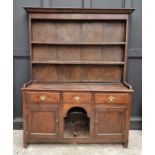 A George III oak 'dog kennel' dresser and rack, 151cm wide.