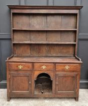 A George III oak 'dog kennel' dresser and rack, 151cm wide.