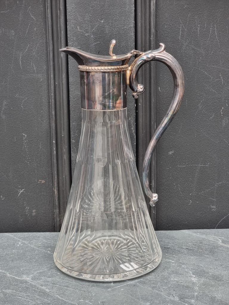 A cut glass and electroplate mounted claret jug, 28.5cm high.