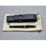 A Montblanc Meisterstuck 'Classique' gold coated fountain pen, with 14ct nib, in Montblanc black