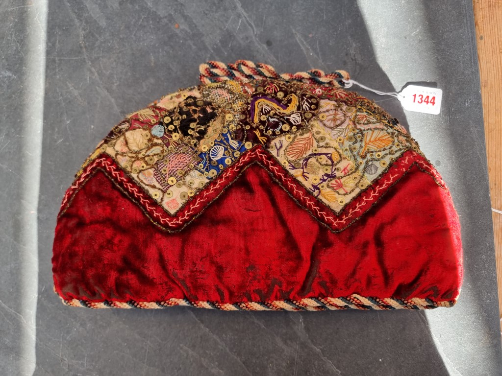 A Victorian embroidered tea cosy, 34cm wide. - Image 2 of 3