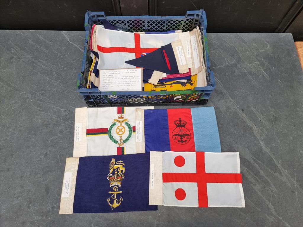 An interesting group of nineteen car bonnet flags and pennants, mostly military. Provenance: Admiral