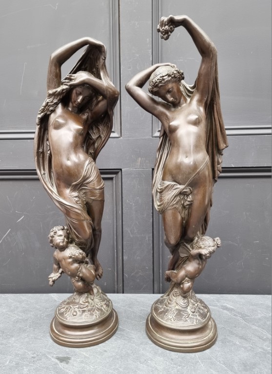 After Jean-Jacque Pradier, a large pair of bronzed resin figures emblematic of 'Night' and 'Day',