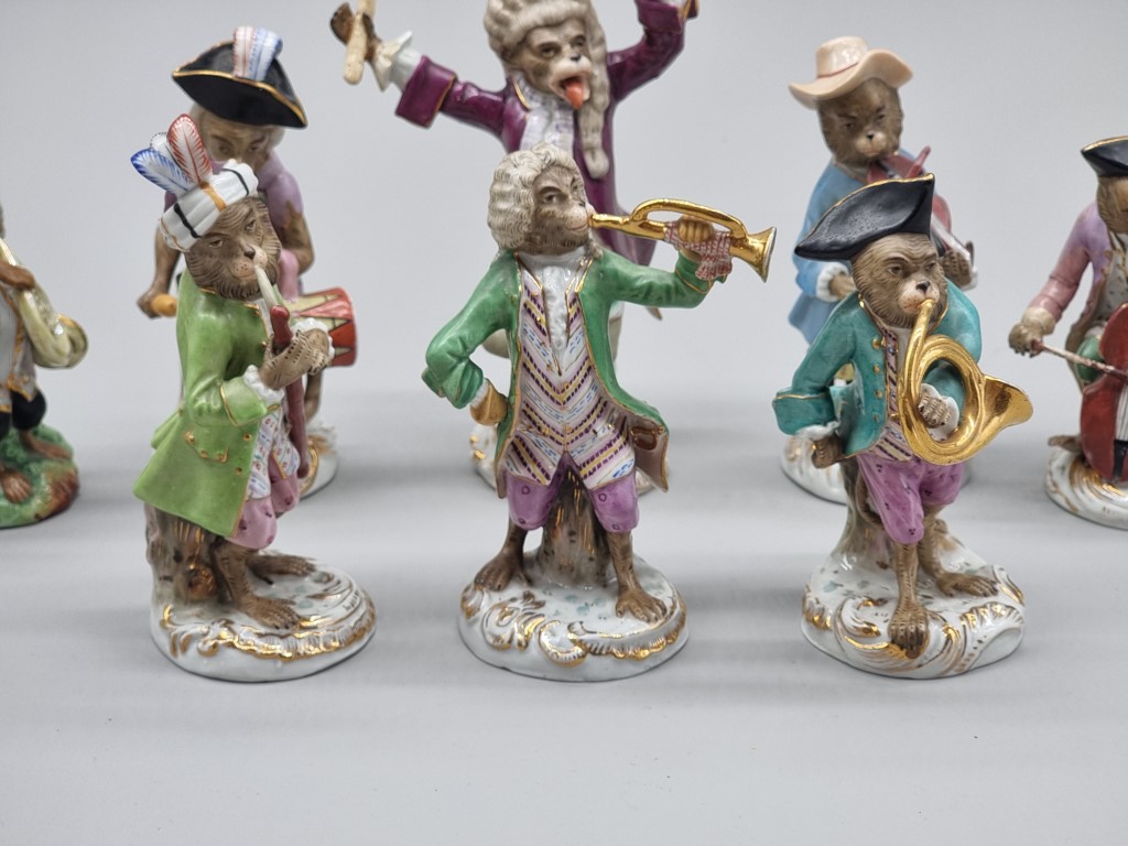 A set of nine Dresden porcelain 'Monkey Band' figures, largest 17cm high; together with another - Image 2 of 6